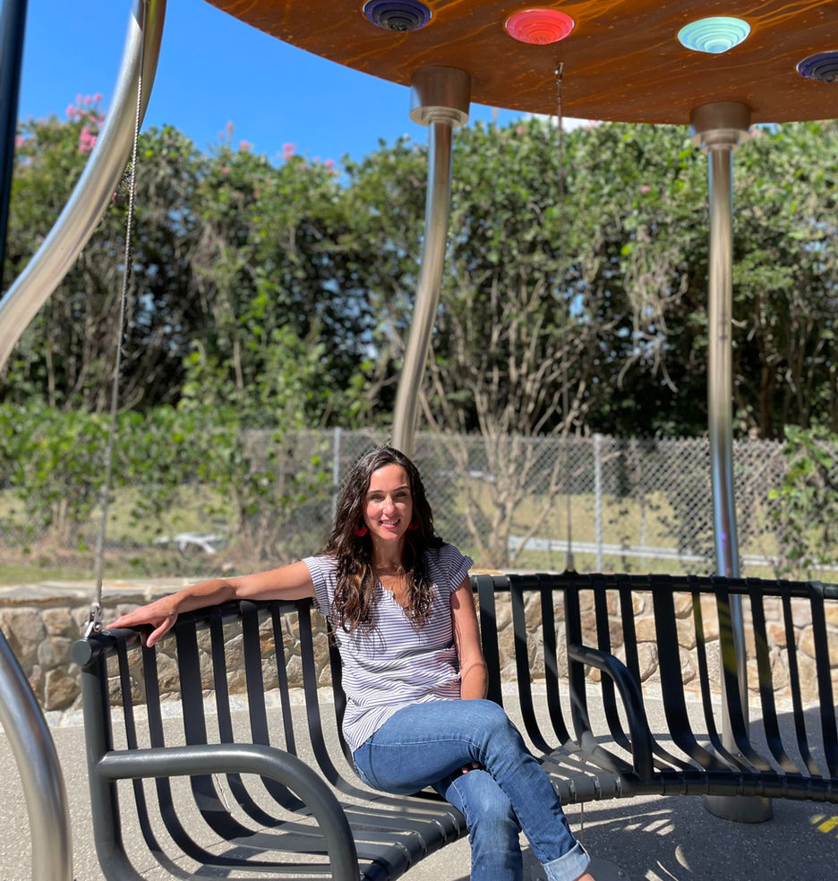 Jocie Sweeney seated outdoors