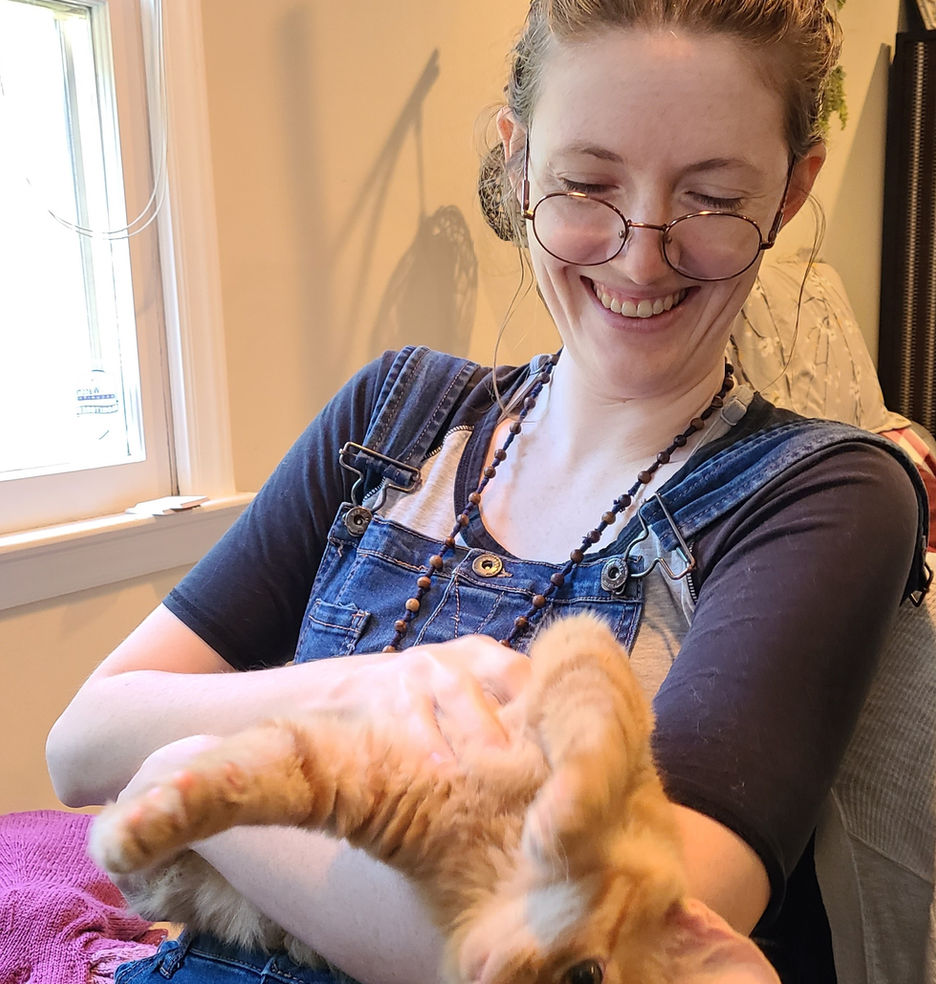 Kate Hoyle holding a cat